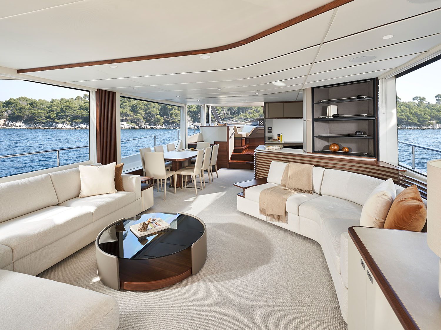 Flybridge of LUMI with the helm, a wet bar and sun loungers