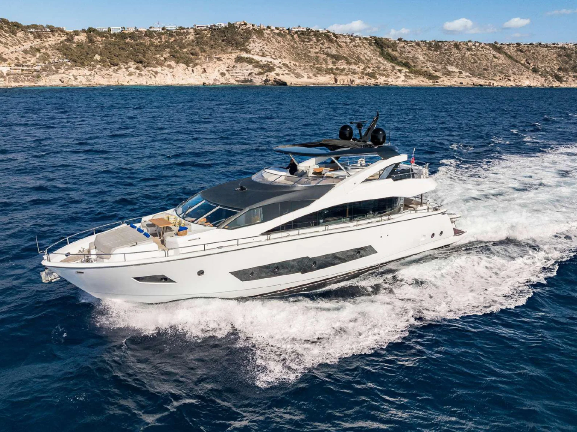 Guest cabin on SEAWATER II with a double berth and hull windows